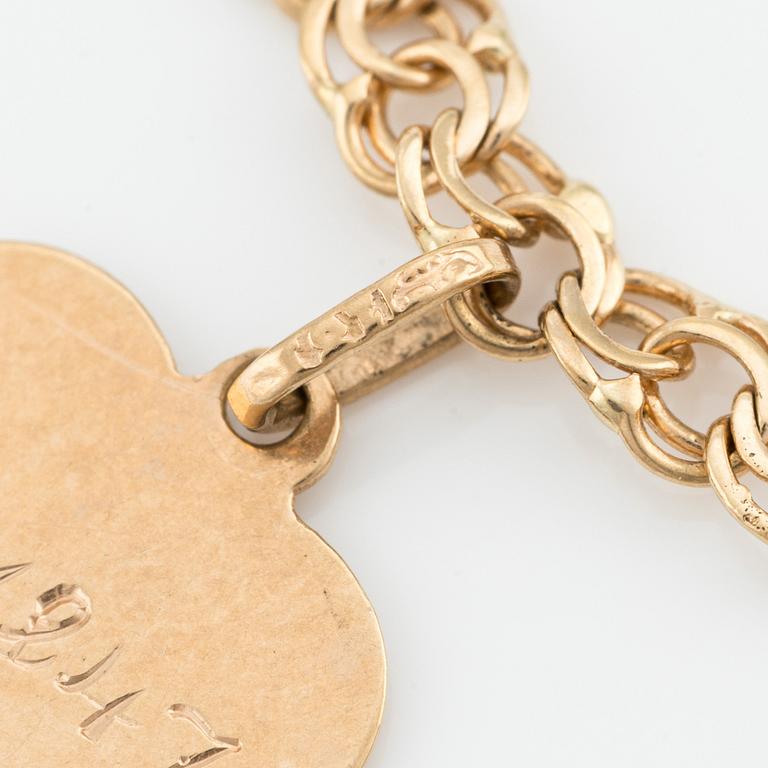 Armband, 18K guld, med berlocker.