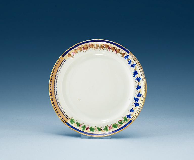 A famille rose 'sample plate' with the monogram AJ, Qing dynasty, Jiaqing (1796-1820).