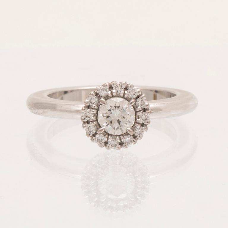 An 18K white gold ring with round brilliant cut diamonds by Engelbert, with GIA dossier.