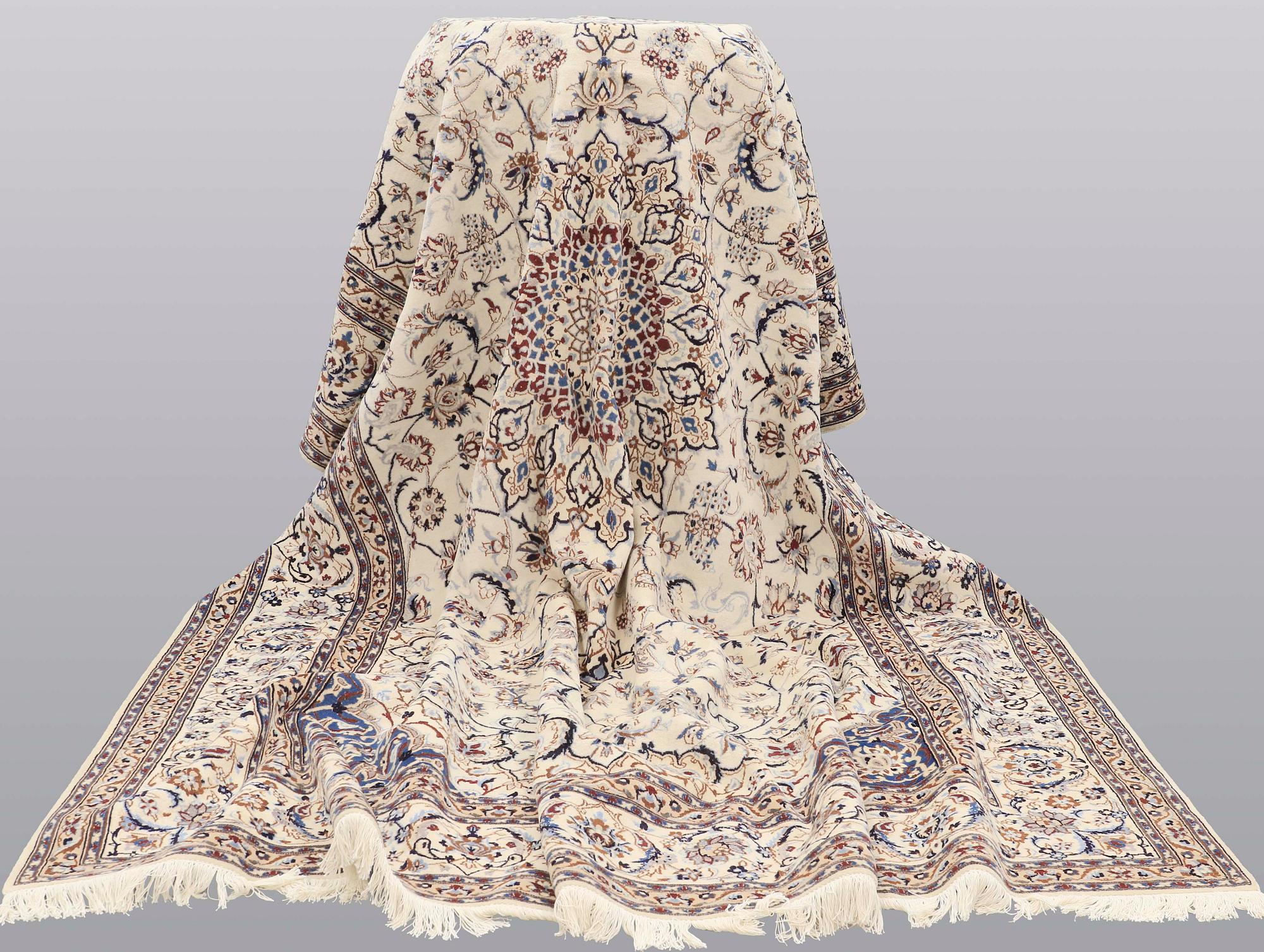 A carpet, Nain part silk, 361 x 262 cm.