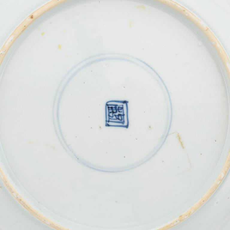 A Chinese dinner plate and a Japanese imari bowl, 18th Century together with a Chinese 19th Century jar with cover.