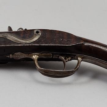 A Danish flint lock pistol signed, (Paul Nielsen Norrman, ca 1700).