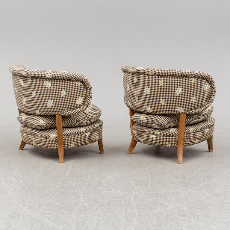 A pair of armchairs, designed by Otto Schultz, mid 20th century.