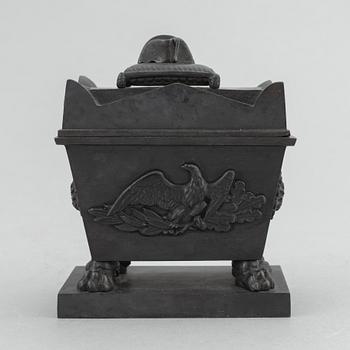A cast iron inkwell in the form of the sarcophagus of Napoleon, Königliche Preußische Eisengießerei, Berlin, ca. 1815-20.
