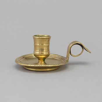 AN 18TH CENTURY BRONZE NIGHT LIGHT.