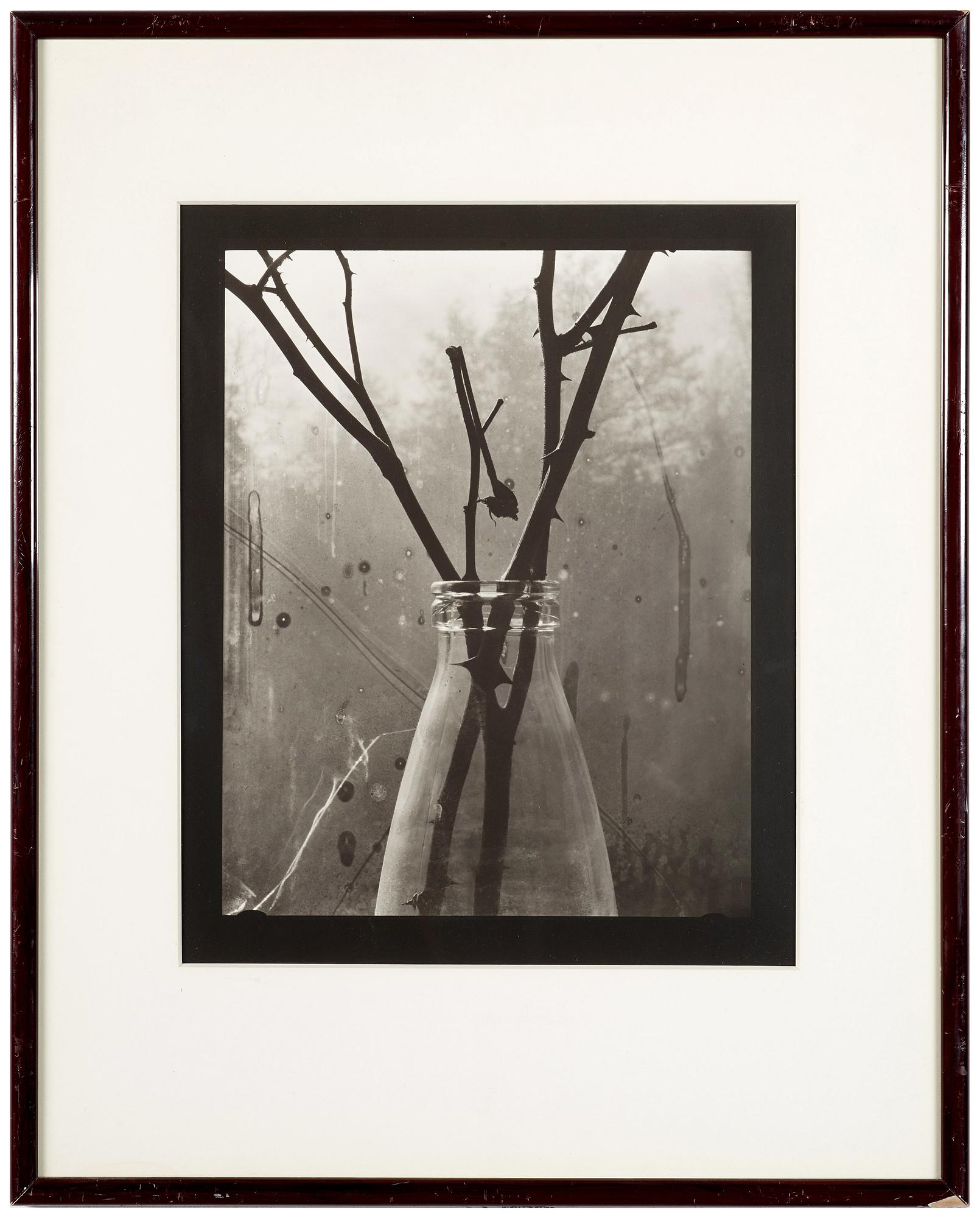 A gelatin silver photograph by GUNNAR SMOLIANSKY, signed and dated 1981 on verso.