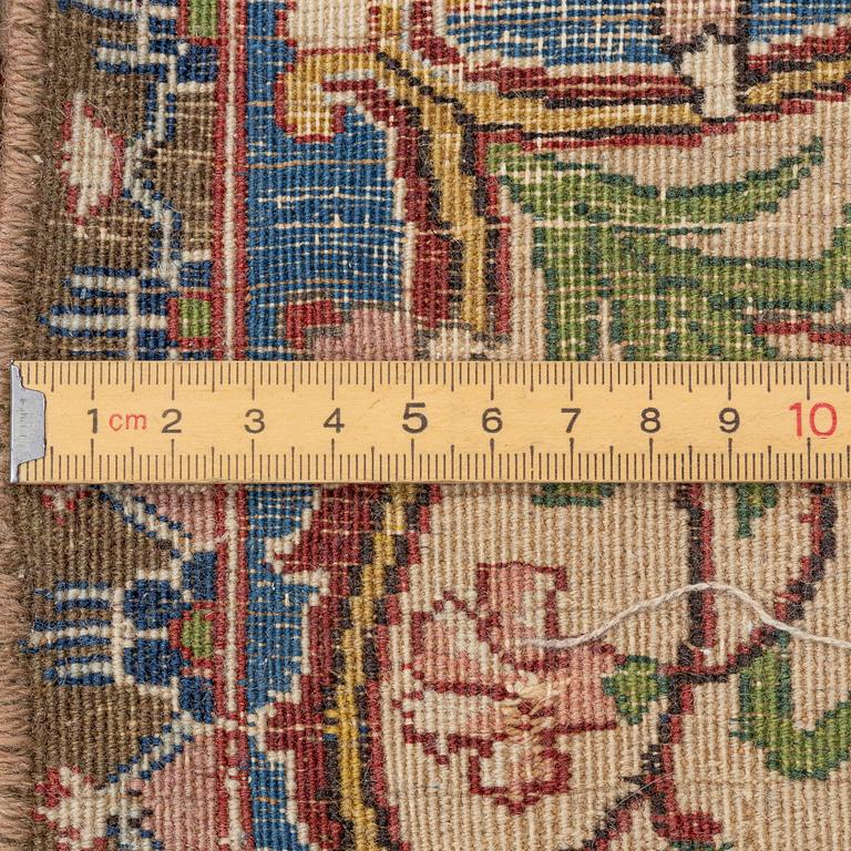 A semi-antique Tabriz carpet, West Persian, c. 250 x 175 cm.