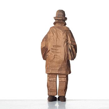 Axel Petersson Döderhultarn, Man holding boots.