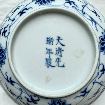 A pair of blue and white 'lotus' dishes, Qing dynasty, Guangxu mark and period (1875-1908).