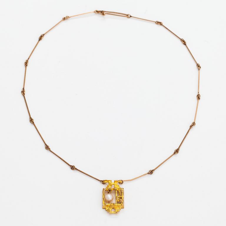 Björn Weckström, Halsband "Magisk pärla", 14K guld och odlad pärla. Lapponia 1967.