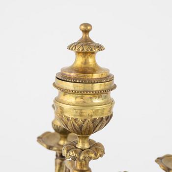A pair of brass candelabra, second half of the 19th Century.