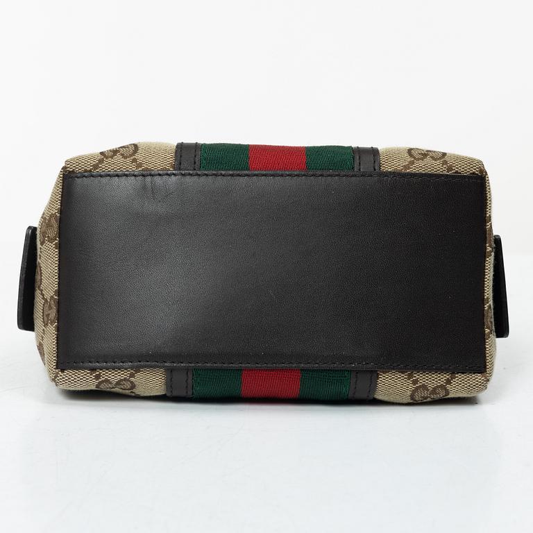 Gucci, bag, "Messenger bag" and toiletry bag.