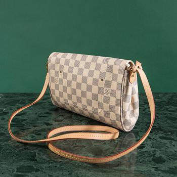 A bag by Louis Vuitton.