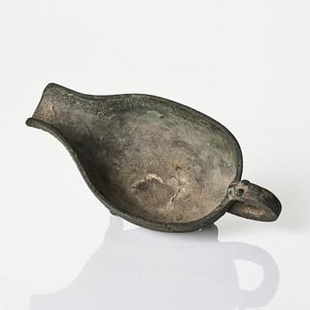 A Chinese brushpot, Qing dynasty, circa 1900. An archaistic bronze ewer and a silvered South East Asian bowl with stand.