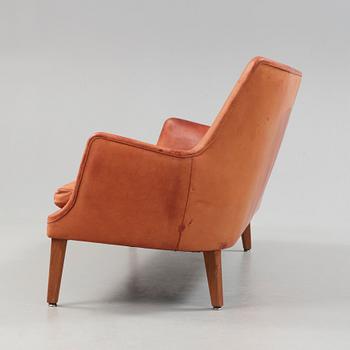 An Arne Vodder brown leather sofa, executed by Ivan Schlechter, Denmark 1950's-60's.