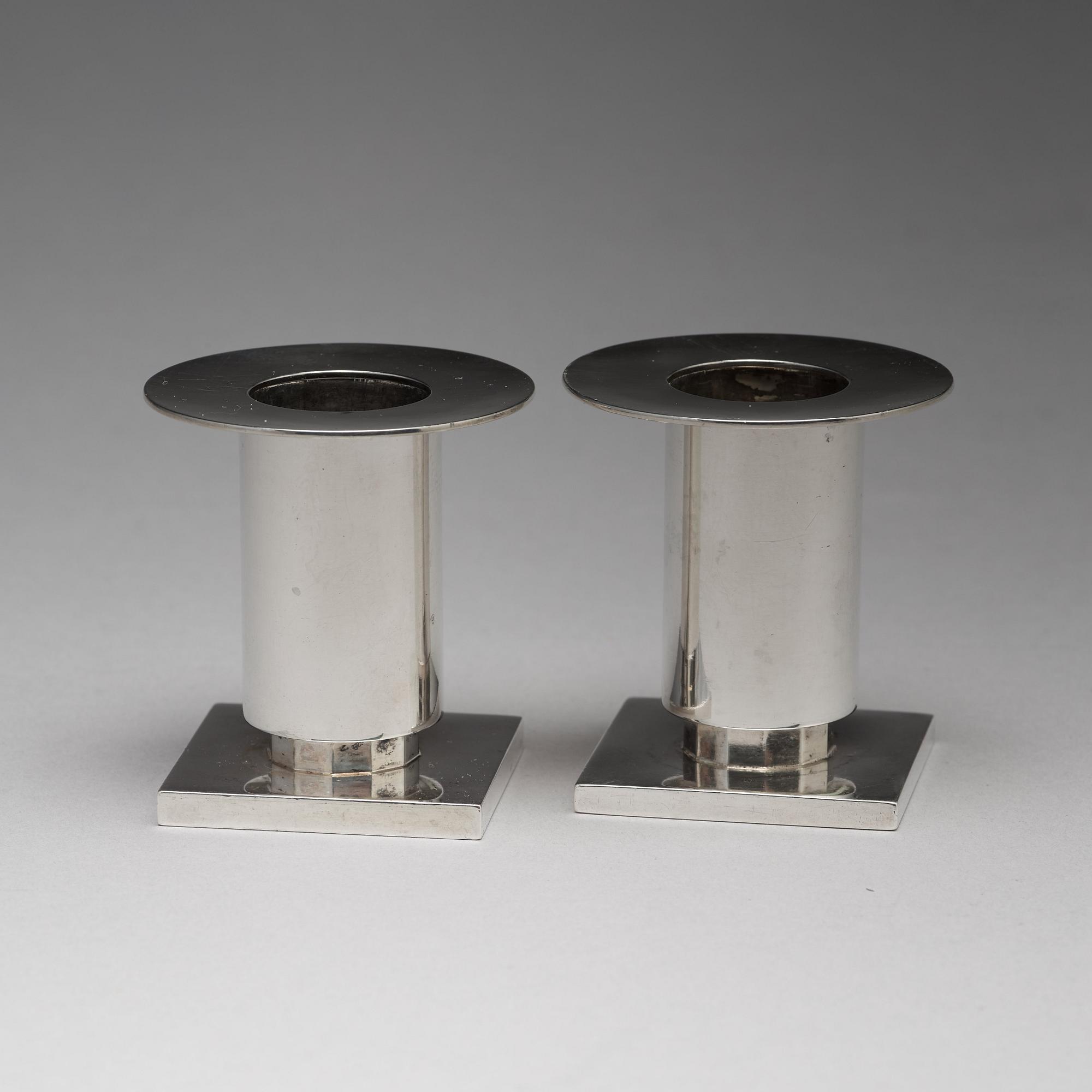 Wiwen Nilsson, a silver set with a pair of candlesticks and a cigarette case, Lund Sweden 1927-38.