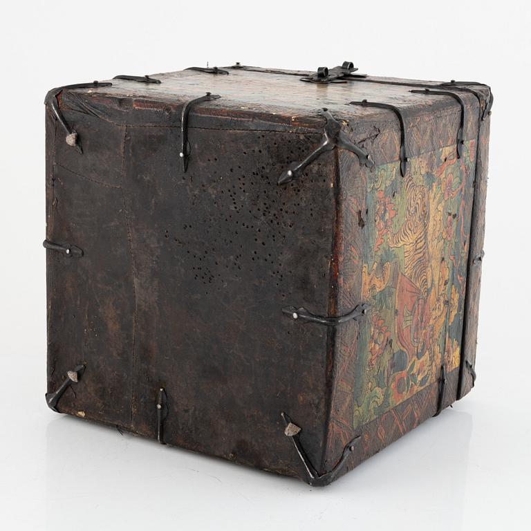 A Tibetan patinated lacquered wooden box, 20th century.