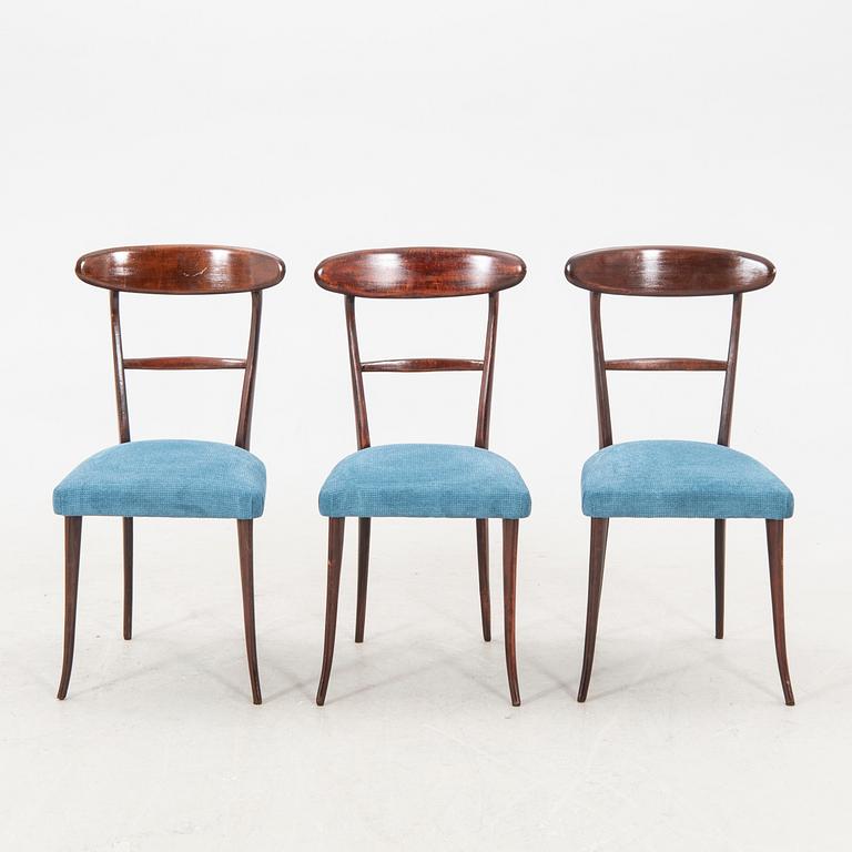 A set of six Italian Mid 1900s walnut chairs.