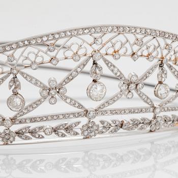 A platinum tiara set with old- and rose-cut diamonds with a total weight of ca 8.00 cts.