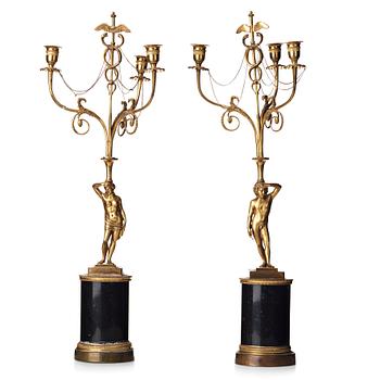 95. A pair of late Gustavian three-light chandeliers, circa 1800.