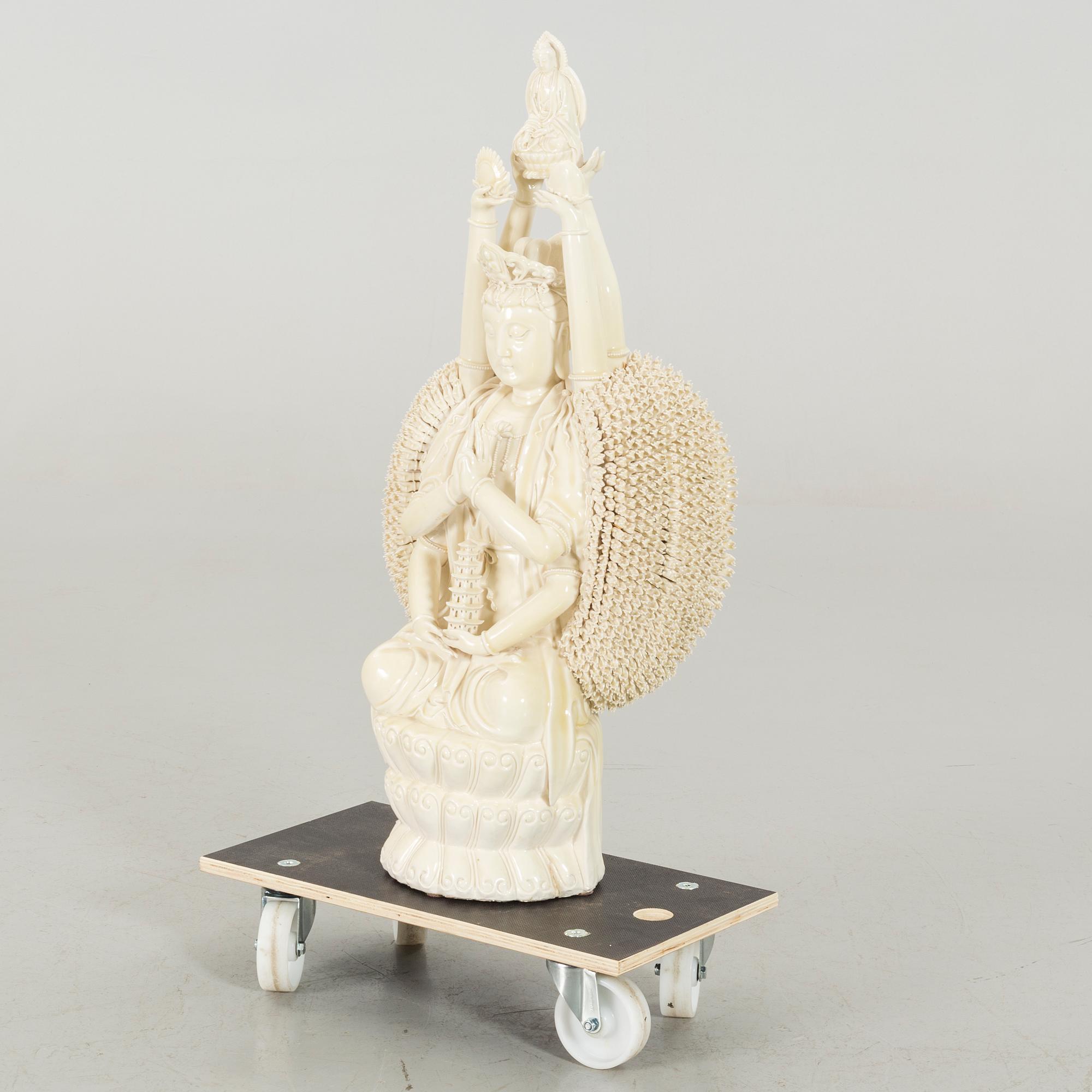 A porcelain figurin, late 20th century,