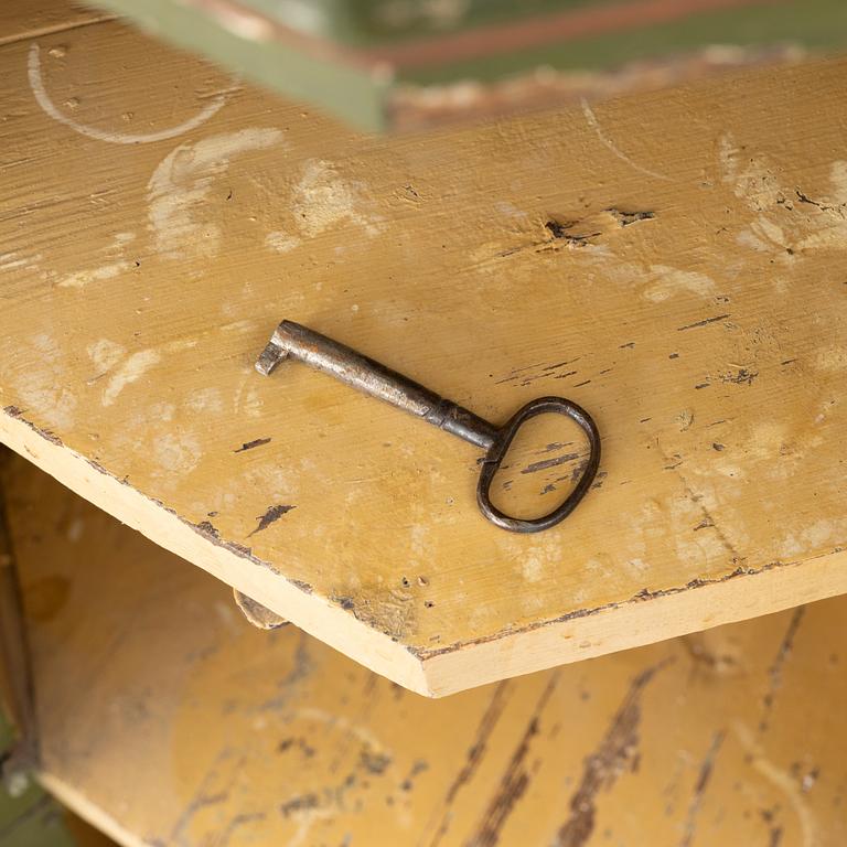 Corner cabinet, likely 18th century.