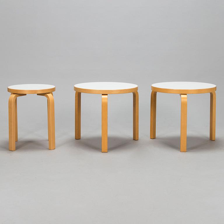 Alvar Aalto, a pair of late 20th century tables, model no 90D and a 21th century stool, model no E60, Artek, Finland.