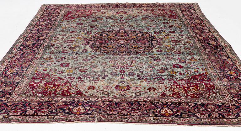 An antique Isfahan carpet, circa 342 x 250-260 cm.