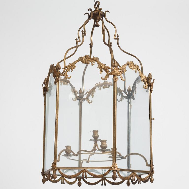 A Swedish rococo gilt-brass four-light lantern, possibly a masterpiece, Stockholm, later part of the 18th century.