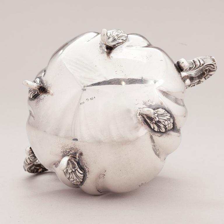 A lidded silver sugar bowl and a set of six silver bowls, Germany.