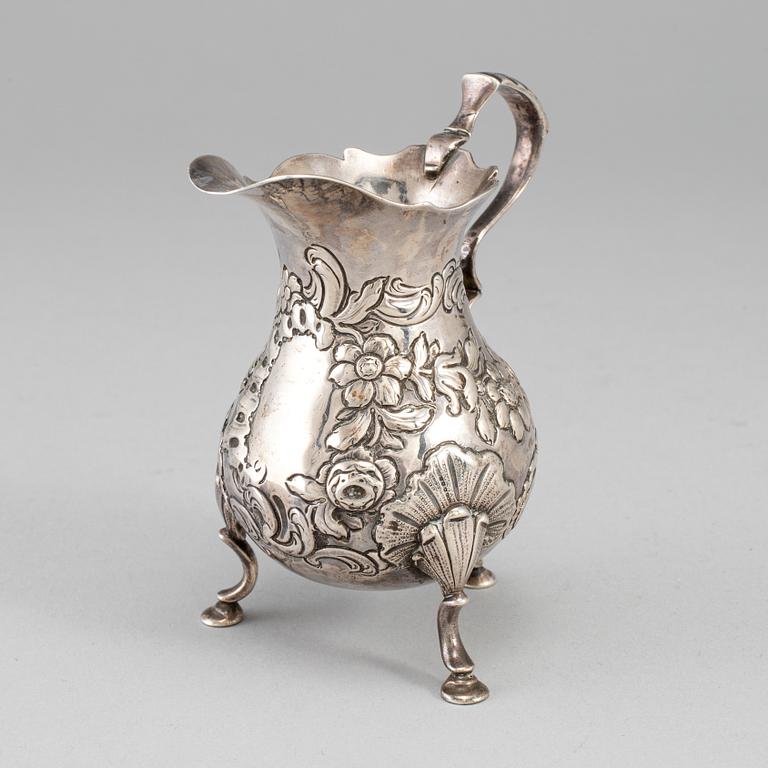 An English mid 18th century silver cream-jug, mark of David Hennell I, London 1754.