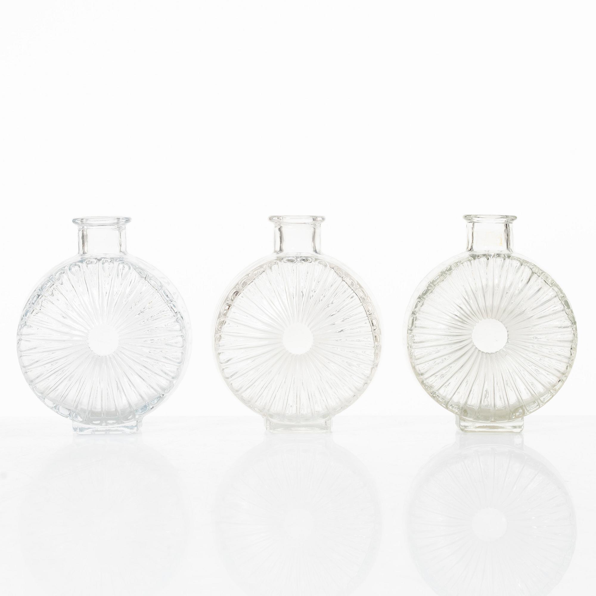 Helena Tynell, six 'Sun bottle' glass flasks, Riihimäen Lasi Oy. Manufactured between 1964-74.
