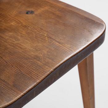Axel Einar Hjorth, a set of six stained pine "Utö" chairs, Nordiska Kompaniet, Sweden, 1930s.