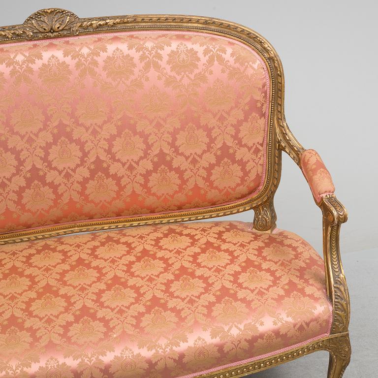 a rococo-style sofa from around 1900.