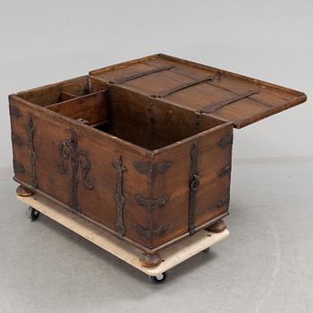 A large 17/17th century baroque oak chest with wrought iron fittings.