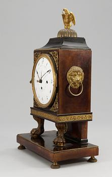 An Austrian Empire mantel clock.
