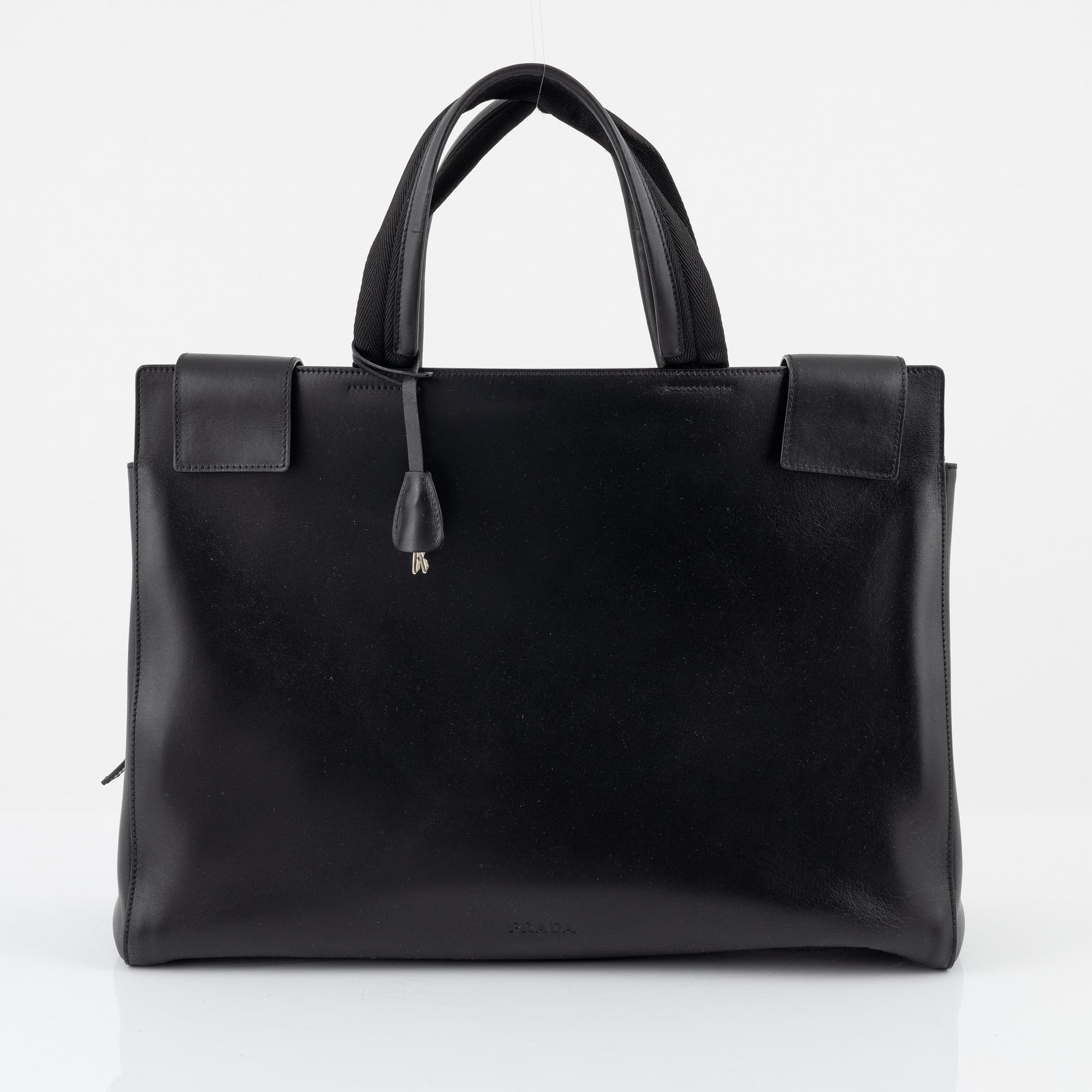 Prada, a black leather bag.