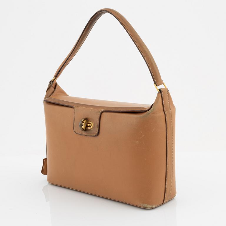 Hermès, a vintage tan leather bag, mid 20th century.