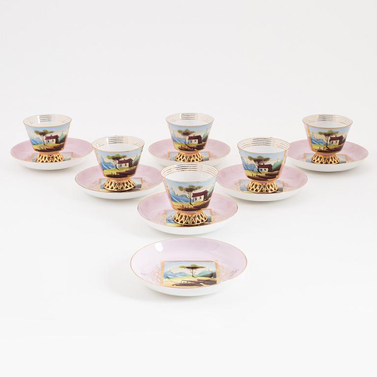 A set of six Russian cups with stands, Kuznetsov (1891-1917).