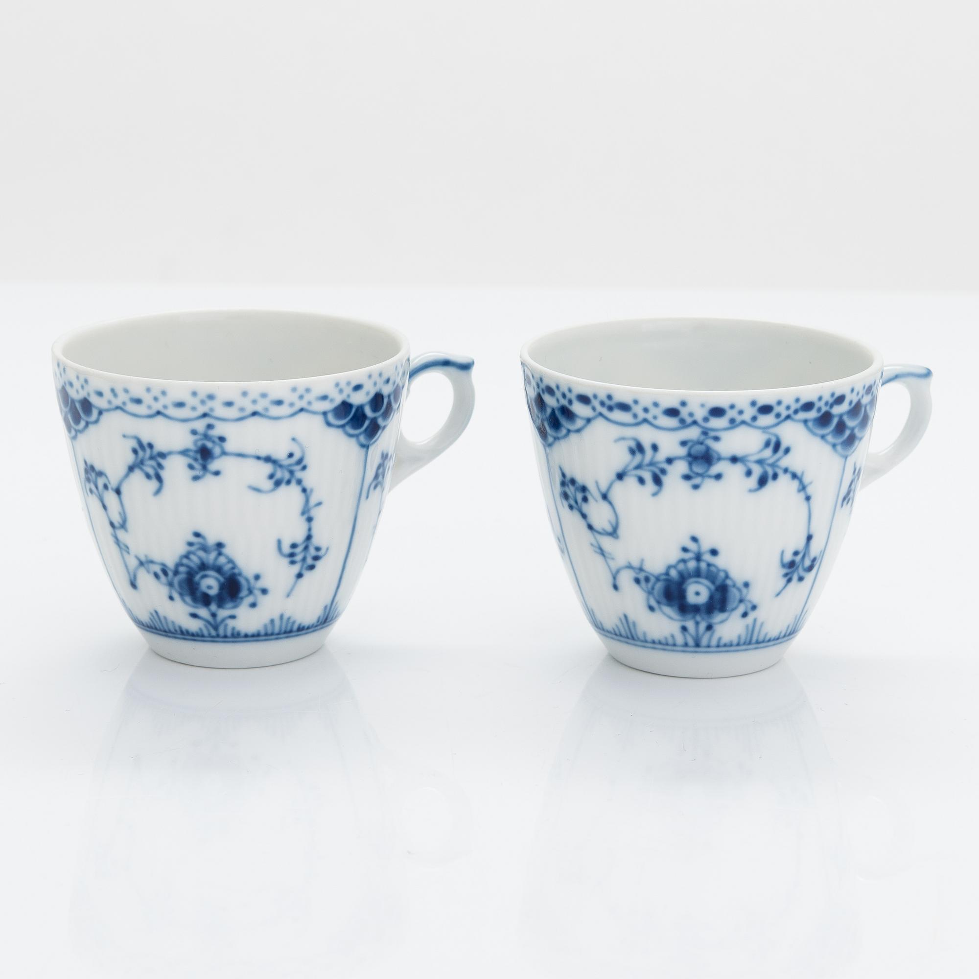 A 31-piece Royal Copenhagen 'Musselmalet' porcelain coffee set.