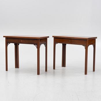 A macthed pair of late Gustavian mahogany veneered card tables one by C D Fick, Stockholm 1776-1806.