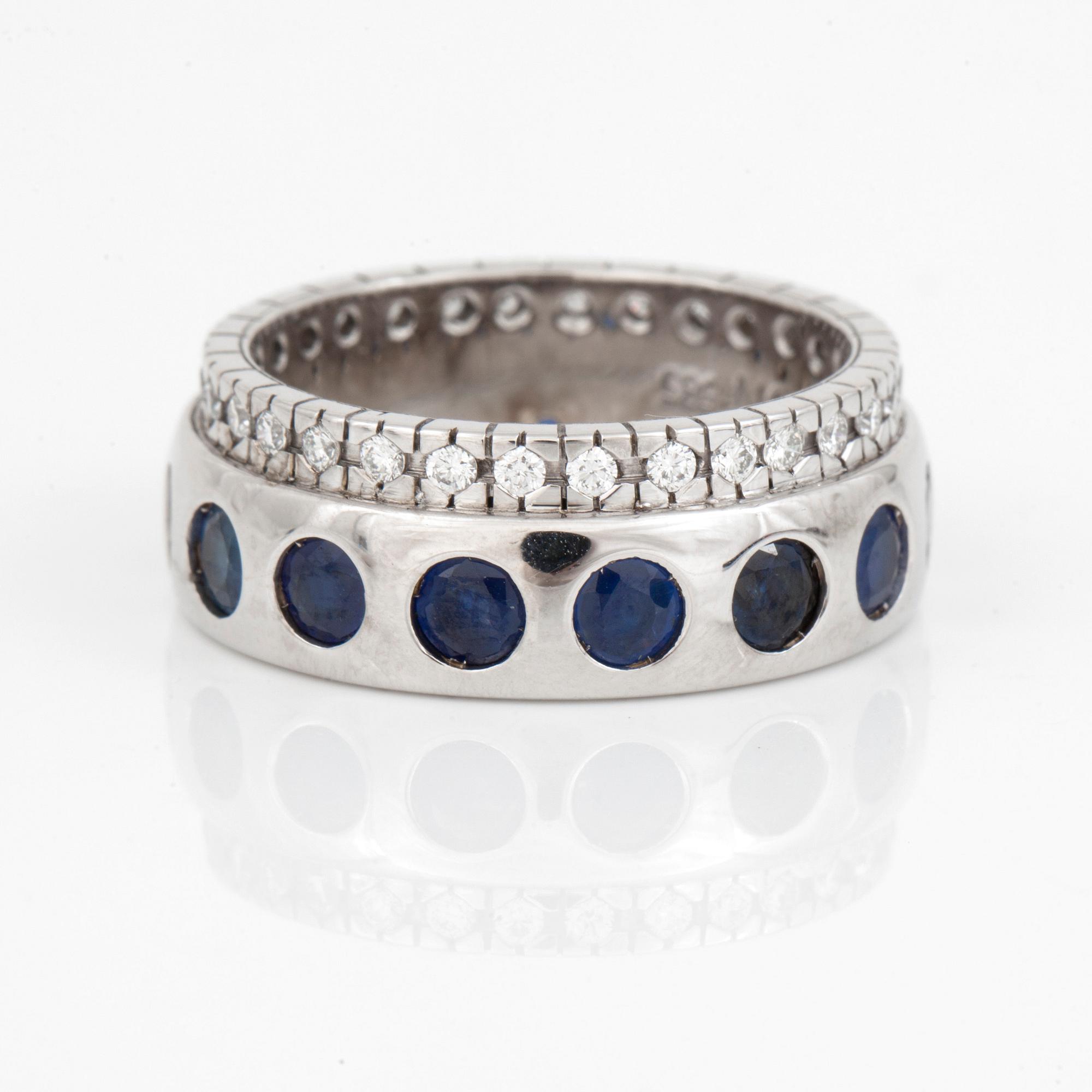 RING, 14K vitguld med safirer totalt ca 3.32 ct och diamanter totalt ca 0.48 ct. Vikt 11,2 gram.