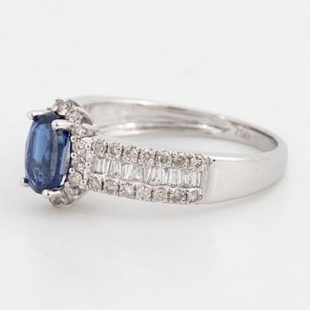 Kyanite and brilliant-cut diamond ring.