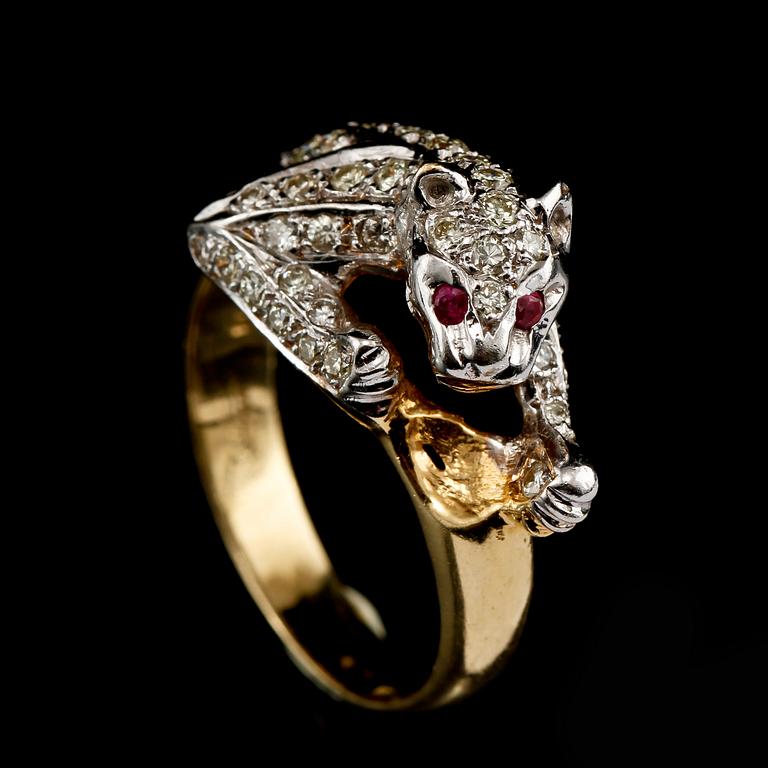 RING, 18k guld och vitguld med 2 rubiner samt 60 små briljantslipade diamanter, 1900/2000-tal. Vikt 7 g.