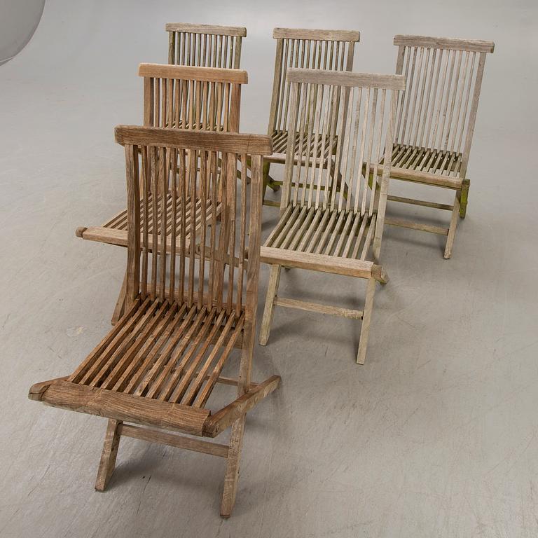 A seven pcs Royal Oak teak garden suite.