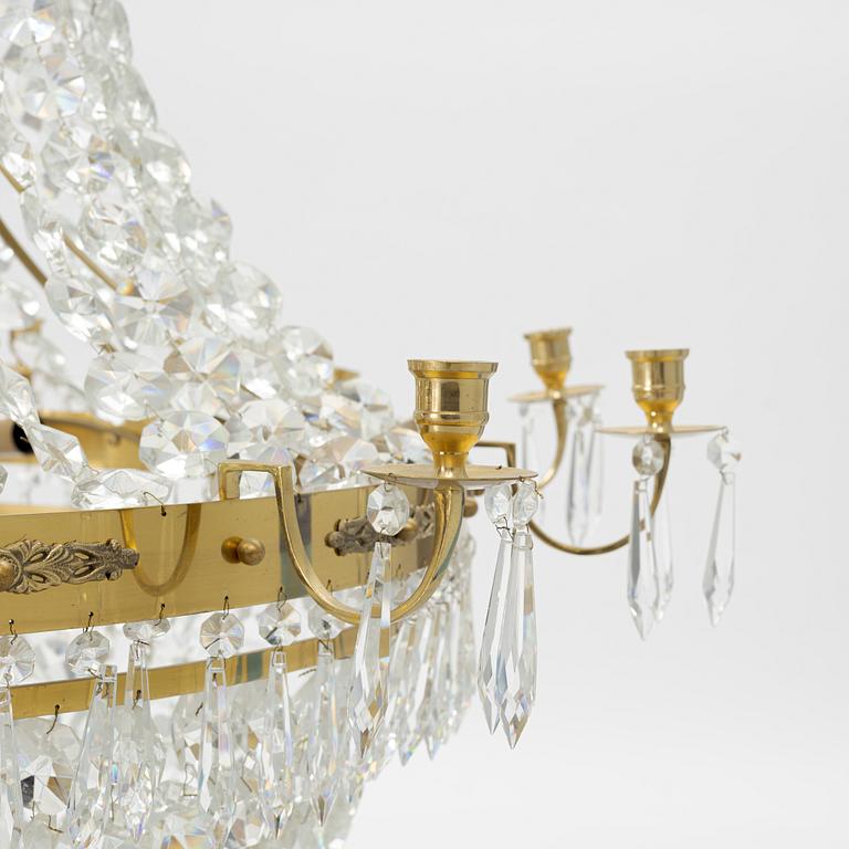 An contemporary empire style chandelier for 12 candles.