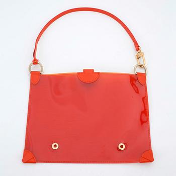 LOUIS VUITTON, a orange plastic pochette.