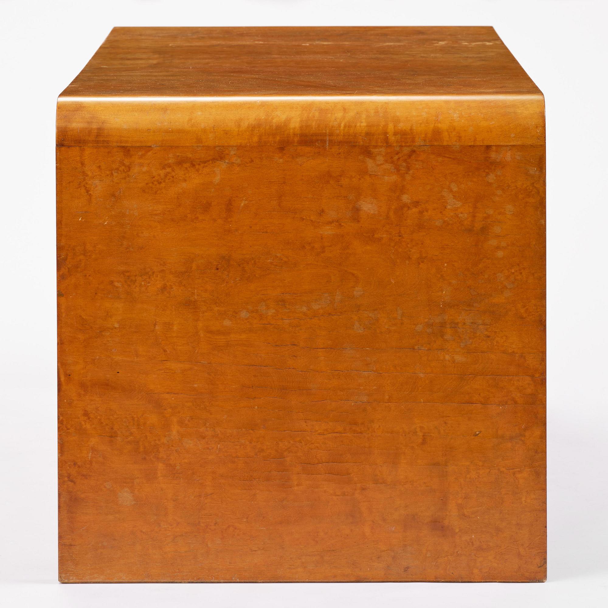 Swedish Modern, a birch veneered coffee table, 1930s-40s.