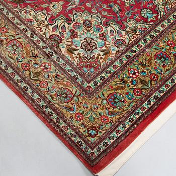 A silk Qum rug, central Persia, approx. 232 x 137 cm.