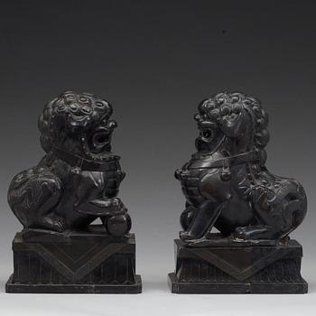 A pair of Chinese buddhist lions in stone, 20th Century.